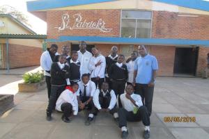 Nkonde in front of St. Patrick School in Mzedy, Malawi.