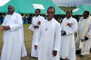 Bro. Lawrence Sitima and Bro. Thomas Edison are leading the procession