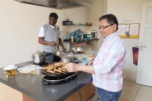 theo and augustine at our kitchen..preparing our lunch meal